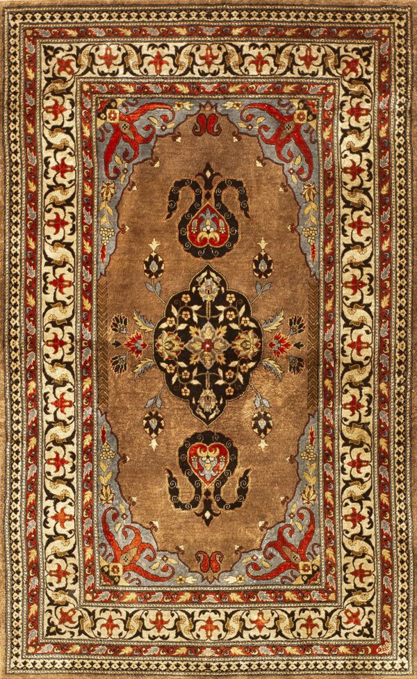 Traditional brown rug with a complex central medallion and ornate borders in red, black, and cream.