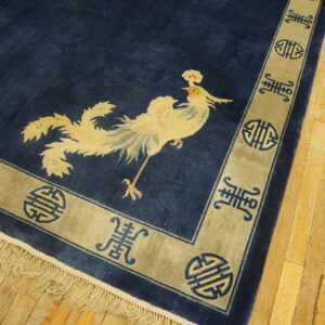Navy rug with golden phoenix design