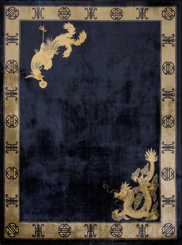 Navy rug with gold dragon design.