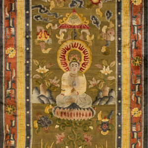 Olive green rug featuring a central seated figure, clouds, and flowers, framed by ornate rust, gold, and dark gray borders.