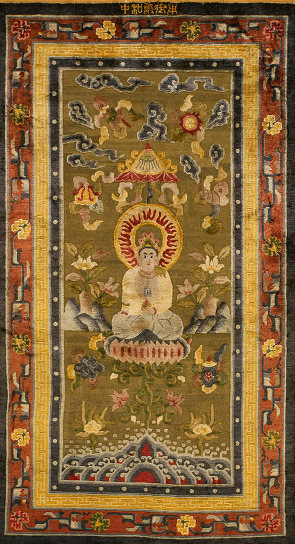 Olive green rug featuring a central seated figure, clouds, and flowers, framed by ornate rust, gold, and dark gray borders.