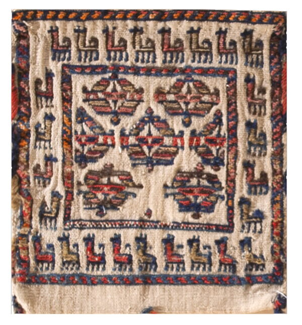 Cream knotted rug fragment featuring rows of stylized blue and red animal figures and geometric motifs.