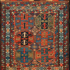 Colorful geometric patterned antique rug