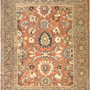 Ornate rug with a rusty red field, large cream and blue palmettes, and complex dark brown borders.