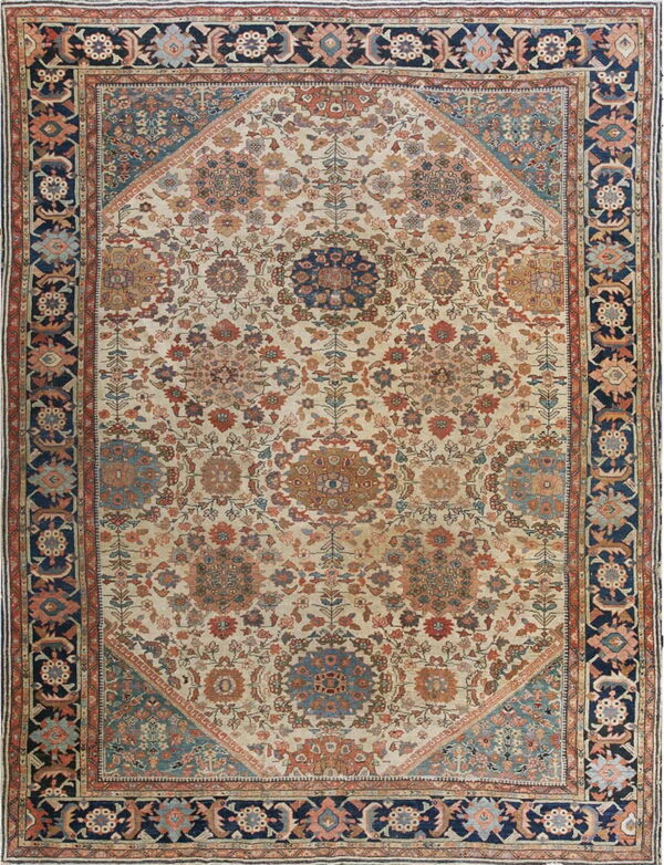 Intricate floral rug with an off-white field, featuring blue, rust, and terracotta motifs and dark navy borders.