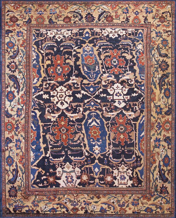 Traditional rug with a navy blue field featuring rust and blue medallions and a beige floral border.