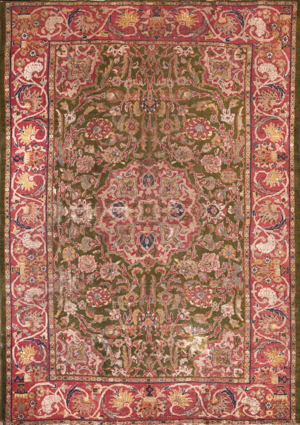 Ornate area rug featuring a central medallion on an olive green field with wide red floral borders.
