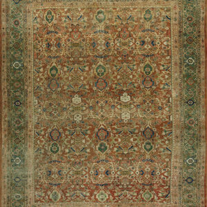 Ornate area rug featuring an all-over terracotta and rust pattern framed by broad green borders.