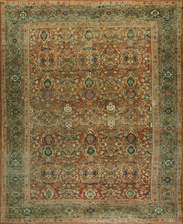 Ornate area rug featuring an all-over terracotta and rust pattern framed by broad green borders.