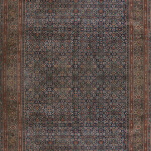 Long runner rug with a dense traditional pattern in deep blue, rust, and olive tones.