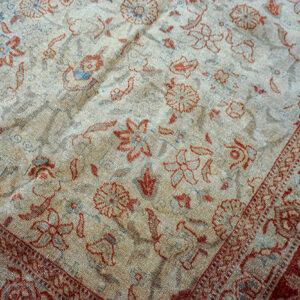 Intricate floral pattern on faded background