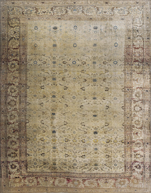 Light beige area rug with intricate multi-layered borders and subtle muted blue and brown floral designs.