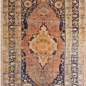 Intricate floral design on vintage rug