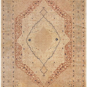 Ornate area rug featuring a central medallion and detailed floral motifs in cream, terracotta, and navy.