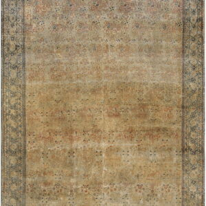 Distressed tan rug with faded gold and rust patterns, surrounded by intricate dark gray decorative borders.