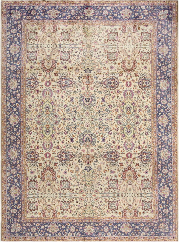 Cream rug featuring a complex floral pattern in maroon and purple with a wide dark blue border.