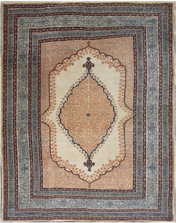 Traditional style cream rug featuring a dense orange floral medallion and dark blue patterned borders.