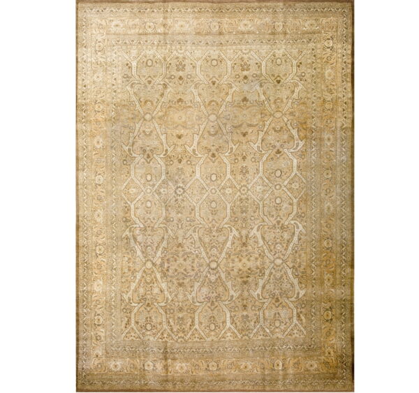 Ornate traditional rug featuring a trellis pattern and detailed border in monochromatic gold and tan colors.