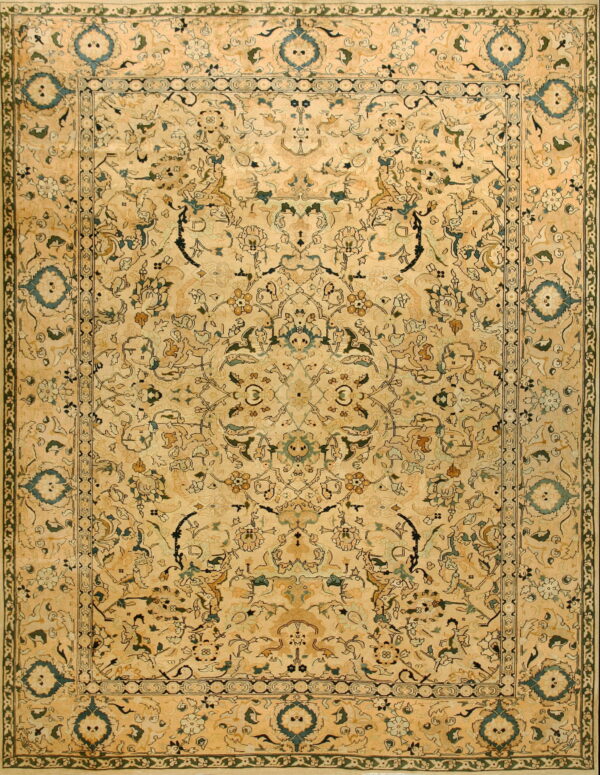 Beige and gold traditional rug featuring an elaborate, symmetrical floral and vine pattern outlined in dark green.