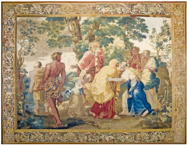 Woven tapestry with a figurative landscape scene and an ornate, detailed floral and scroll motif border.