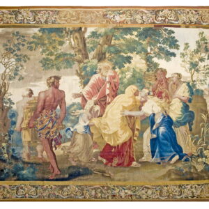 Woven tapestry with an elaborate floral and scrolling border framing a narrative scene of figures and trees.