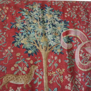 Colorful tapestry with trees and animals