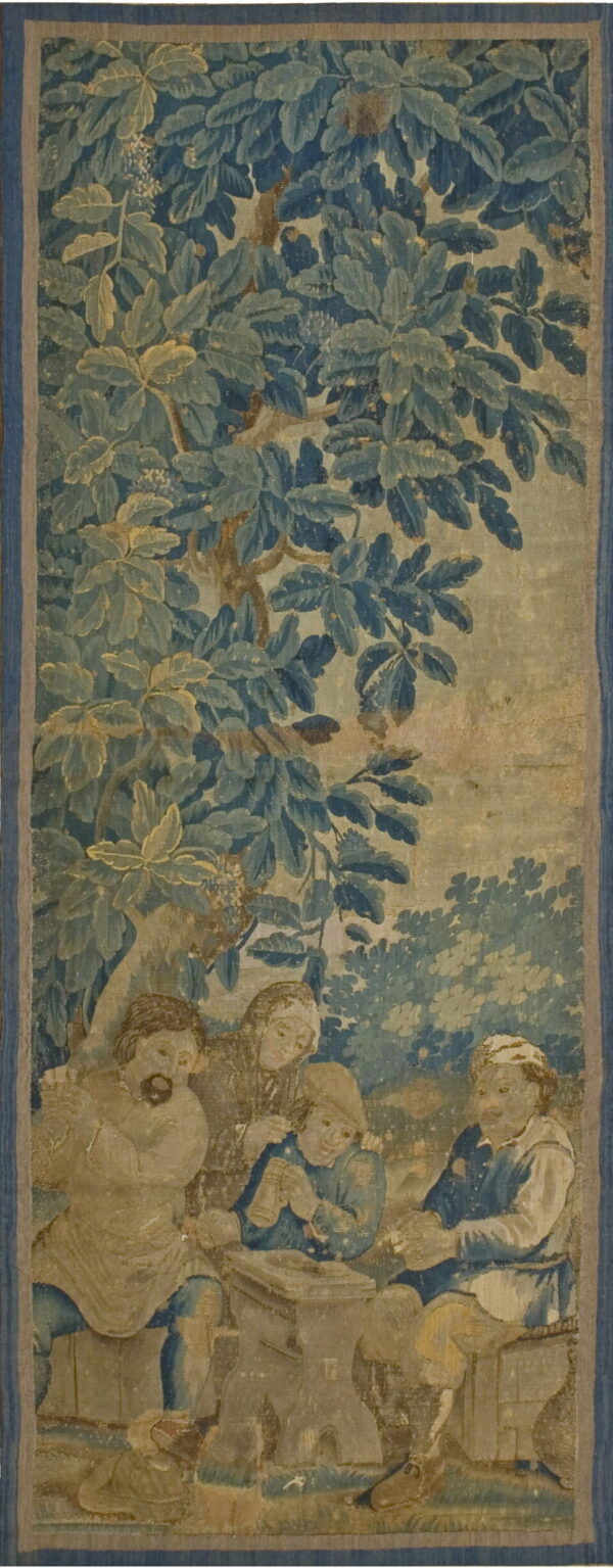 Pictorial tapestry woven in blue, teal, and tan depicting four figures beneath heavy, leafy woodland foliage.