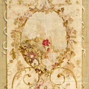 Cream and pale green rug displaying an elaborate floral bouquet, grapevine garlands, and golden scrolled cartouches.
