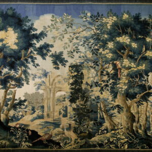 Woven woodland scene in blue, green, and beige, showing trees, birds, and architectural ruins.