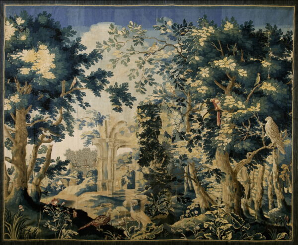 Woven woodland scene in blue, green, and beige, showing trees, birds, and architectural ruins.