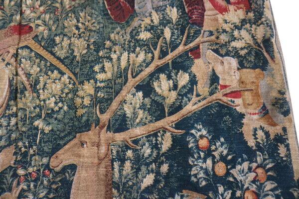 Deer among lush foliage and animals