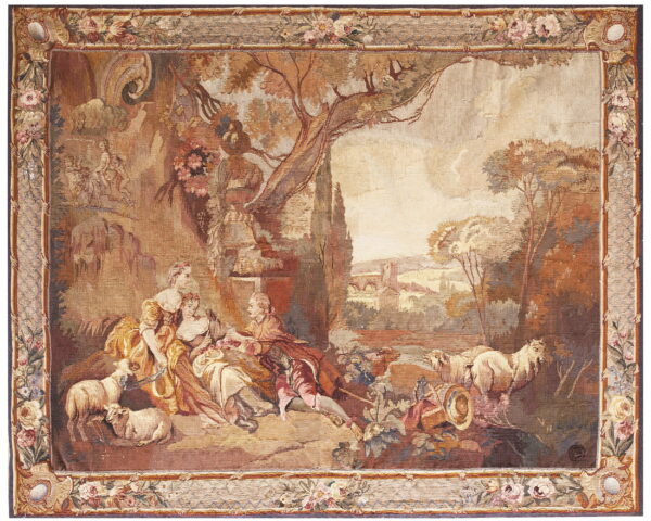 Earth-toned flatweave rug depicting a complex pastoral landscape with reclining figures, sheep, and a floral border.