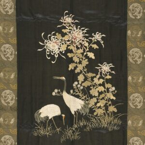 Black textile featuring embroidered white cranes and gold flowers bordered by olive green dragon medallions.