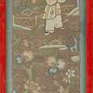 Vertical framed textile featuring two light-colored figures amid brown, green, and tan foliage in a vibrant red frame.