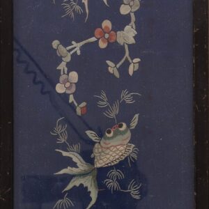Framed navy blue textile embroidered with vertical vines, pale flowers, and two colorful goldfish.