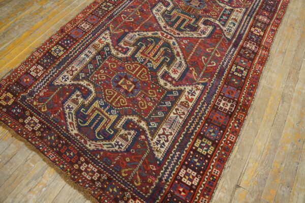 Colorful intricate patterned wool rug