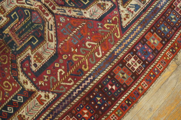 Colorful intricate patterned wool rug