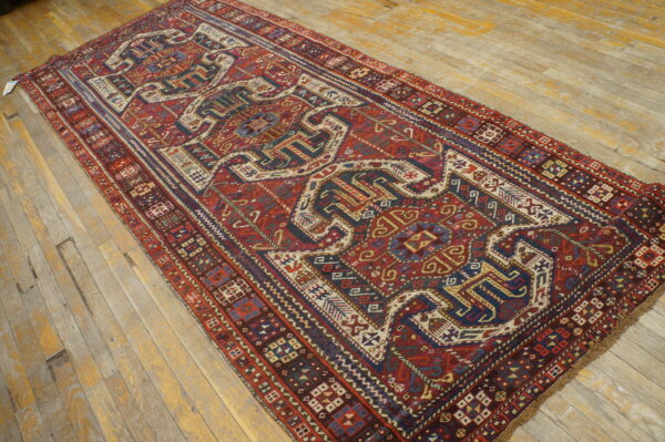Colorful intricate patterned wool rug