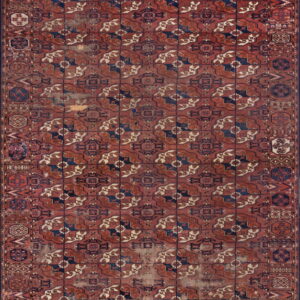 Distressed, low-pile rug featuring a geometric lattice pattern in deep red, navy blue, and cream.