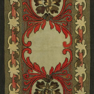 Highly textured rug featuring a central cream medallion, bold red scrolls, brown foliage, and an olive green border.