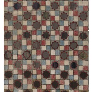 Highly textured rug featuring a colorful checkerboard pattern with dark star-like medallions.