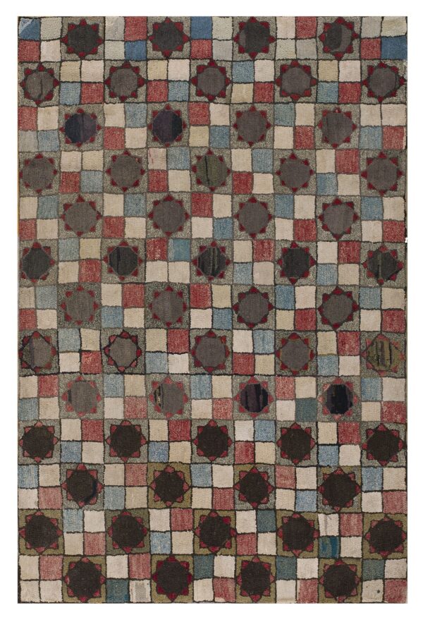Highly textured rug featuring a colorful checkerboard pattern with dark star-like medallions.