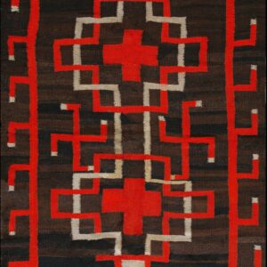 Dark brown flatweave rug featuring a central interlocking maze design in bold red and off-white geometric lines.