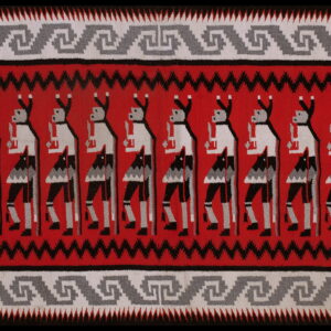 Red, black, and gray flatweave rug with a row of stylized figures and geometric scrollwork borders.