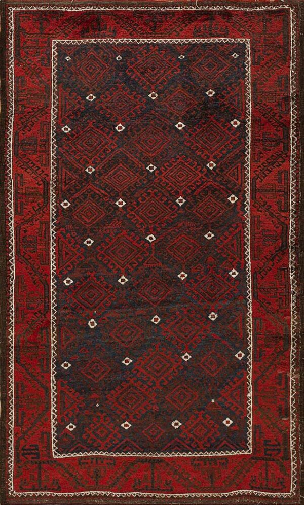 Red and dark blue rug featuring geometric diamond patterns, bordered by a thin white stitch line.