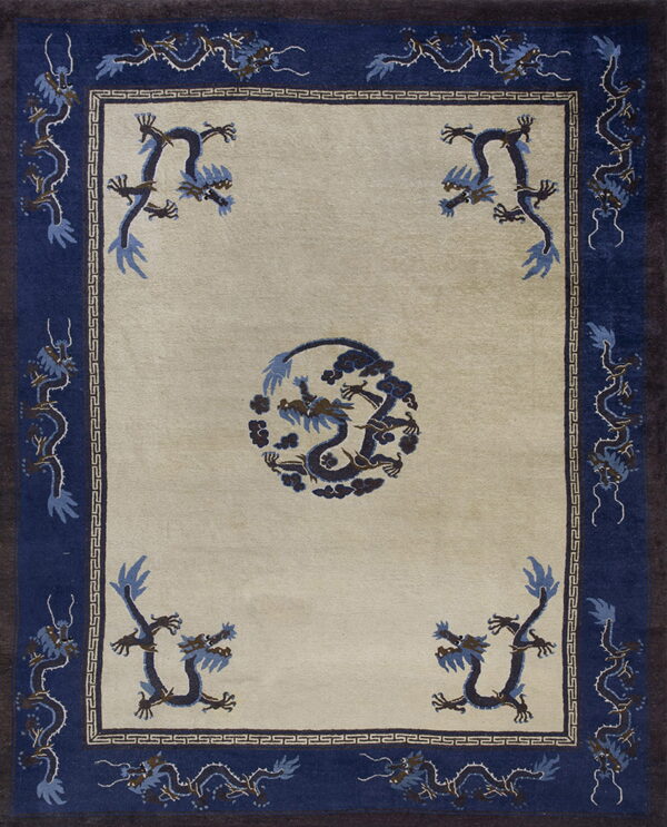 Beige rug featuring dark blue dragon designs in the center, corners, and wide navy border.
