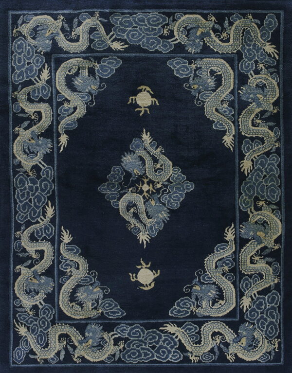 High-pile navy rug with light-colored dragon and cloud motifs in the border and field.