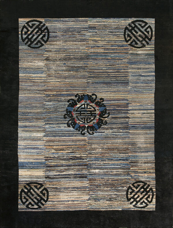 Low-pile rug with variegated horizontal stripes, a dark border, corner knot motifs, and a colorful central medallion.