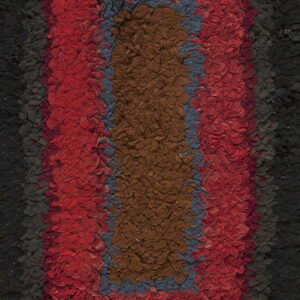 High-texture rug with concentric vertical blocks of brown, blue, red, and dark charcoal black.