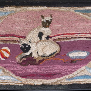 Shaggy, rustic rug depicting two cats within a pink and purple oval, framed by blue and black borders.